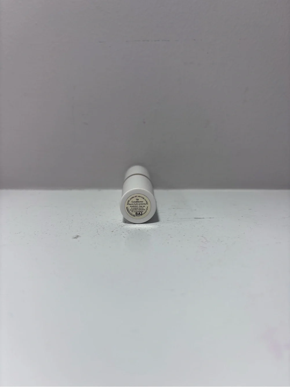 Estée Lauder Lip Conditioner Lipstick .13 Fl Oz - White Tube with Gold Accent